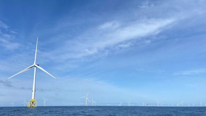 Offshore windfarm showing turbines in the ocean